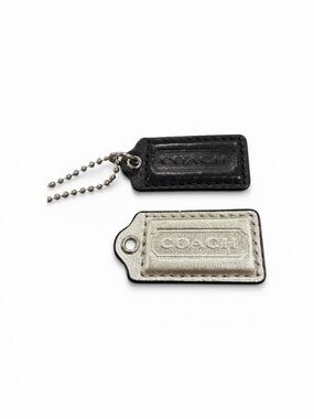 Set of two 1.5” x .75” Coach Poppy Silver & Black Hangtags